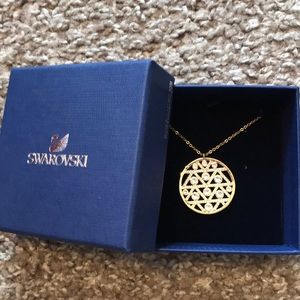 Yellow gold Swarovski pendant. Only worn once!